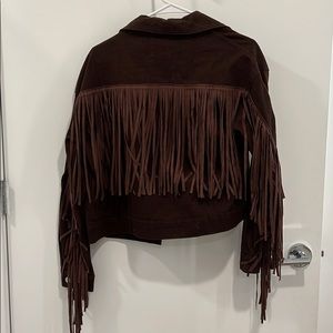 Brown denim jacket with fringe on back and sleeves